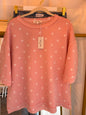 pink polka dot shirt